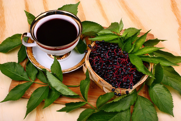 Fresh cup tea fruit elderberry - Photo, Image