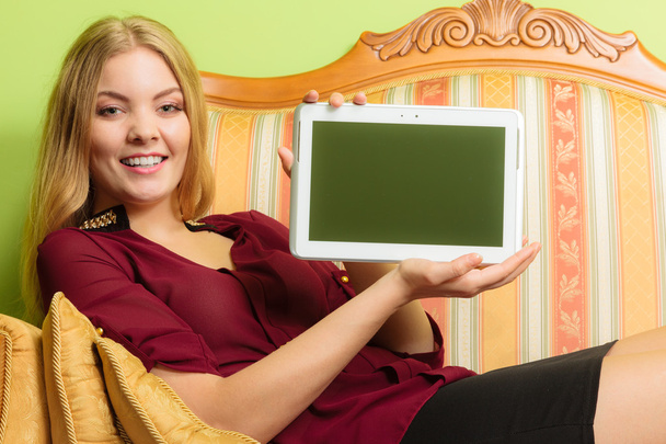 Woman with pc tablet. Blank screen copyspace. - Photo, image