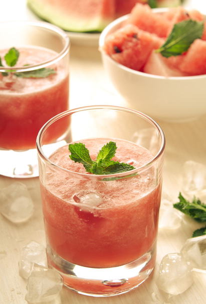 Healthy watermelon smoothie with mint and ice in glass - Photo, image