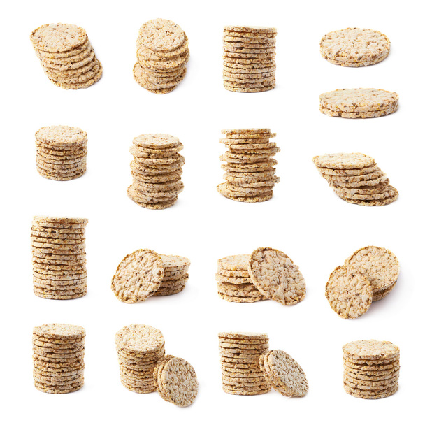 Pile of diet rice crackers isolated - 写真・画像