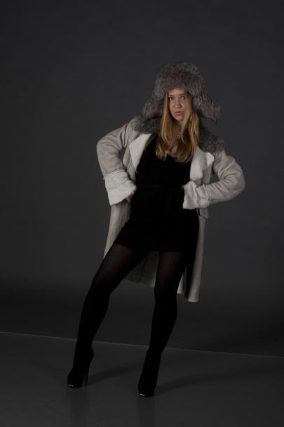 Portrait of a beautiful girl in winter clothes - Foto, immagini