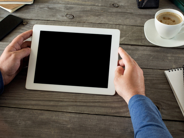 Man holding tablet with blank screen - Photo, image