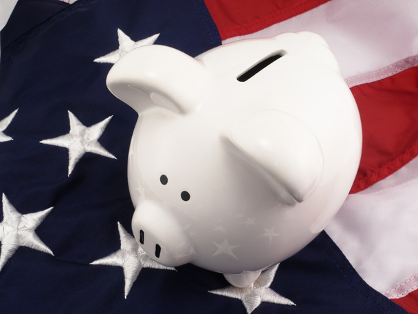 Piggy Bank Over American Flag - Foto, afbeelding