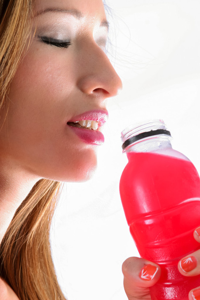 Latina girl with isotonic drink - 写真・画像