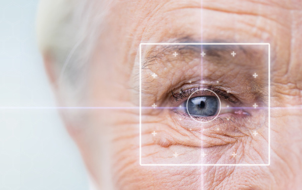 close up of senior woman face and eye - Foto, Imagem