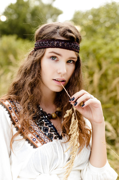 Young girl in folk clothes - Foto, Imagen