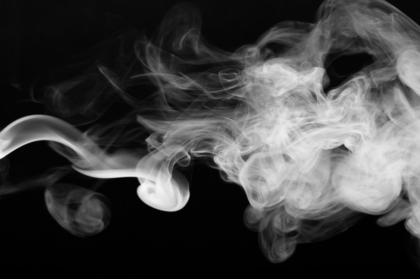 Cloud of smoke on black background. Selective focus - Zdjęcie, obraz