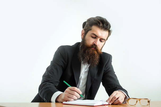 bearded man teacher at table - Φωτογραφία, εικόνα