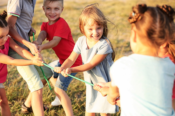 Happy kids playing in park - Φωτογραφία, εικόνα