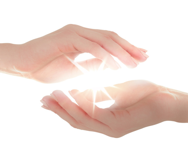 Female hands holding light  - Zdjęcie, obraz