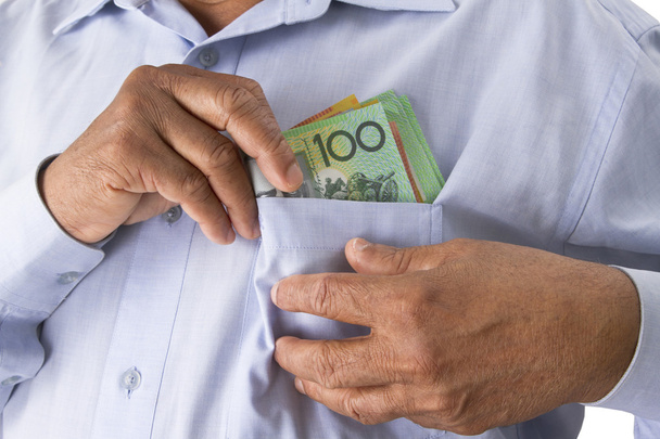Verificação ou contagem de dólares australianos na mão
. - Foto, Imagem