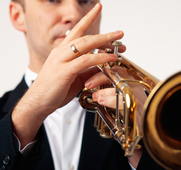 Portrait of a man playing his Trumpet - Foto, Imagen