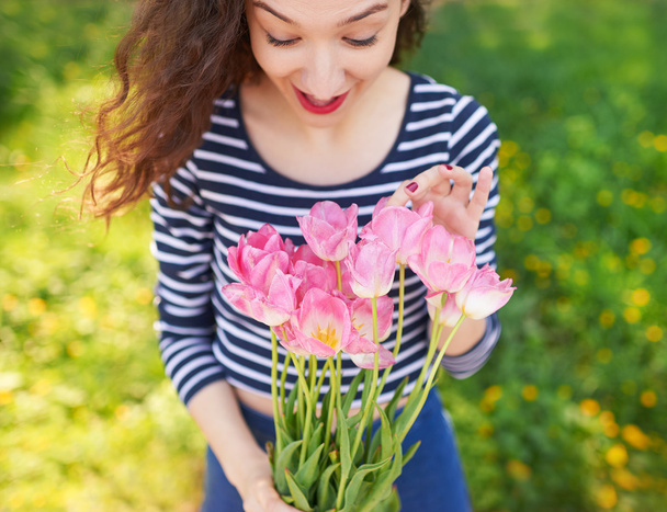 Beautiful girl with tulips - Foto, Imagem