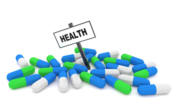 Gesundheitspillen-Konzept mit Pillen isoliert auf weißem Hintergrund - Foto, Bild