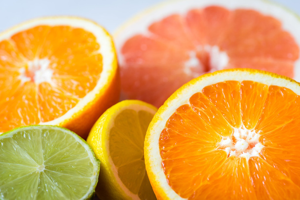 Grapefruits, oranges, limes, lemons. - Foto, afbeelding