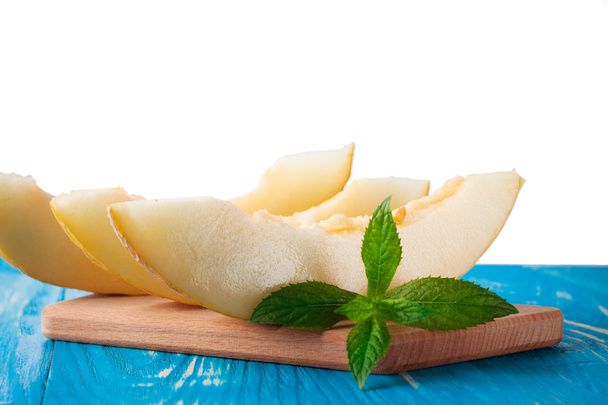 Ripe fresh melon slices and mint  - Photo, Image
