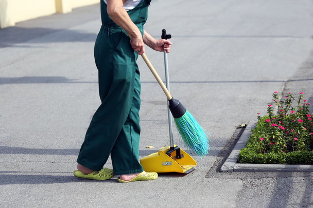 the janitor sweeping broom street - Photo, Image
