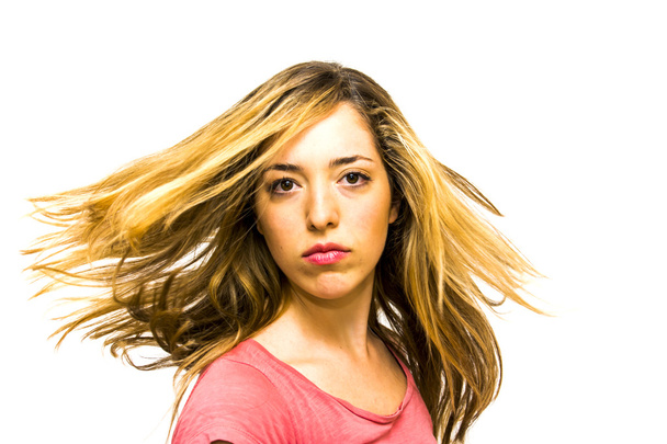 Portrait of Beautiful Young Woman Shaking Her Hair  - Foto, afbeelding