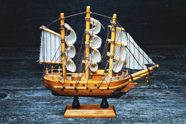 Miniature wooden model of sailboat - Фото, изображение