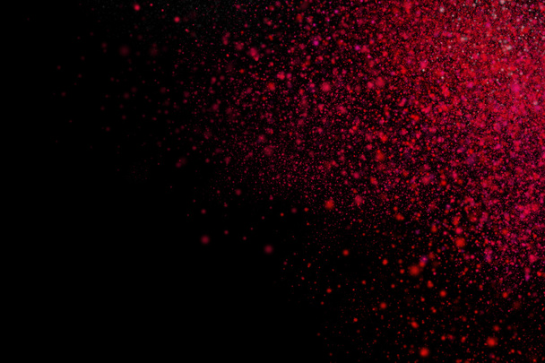 Colourful abstract powder explosion on a black background - Foto, imagen