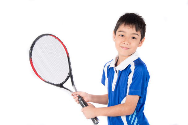 Little boy playing tennis racket and tennis ball in hand - Φωτογραφία, εικόνα