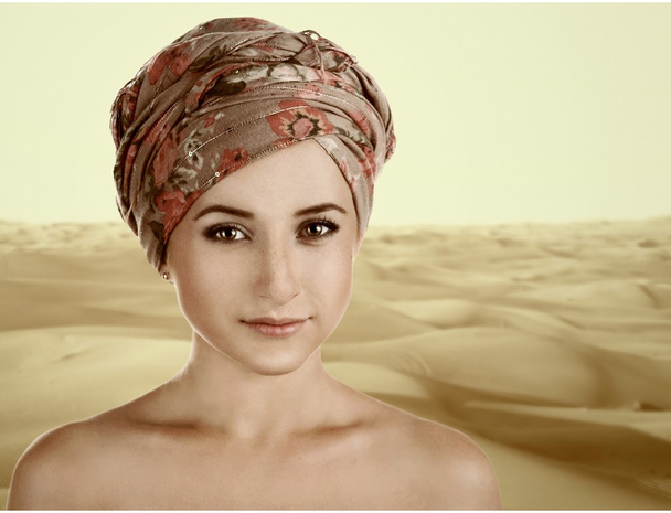 portrait of white-skinned girl in a turban. caucasian woman with - Valokuva, kuva