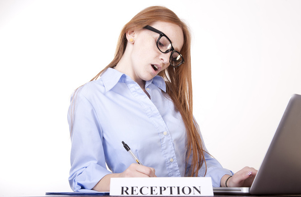 Young attractive female receptionist - Photo, image