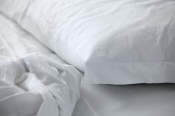 Close up of bedding sheets and pillow - Foto, imagen
