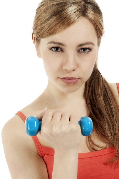 Portrait of a fitness woman with a dumbbell - Zdjęcie, obraz