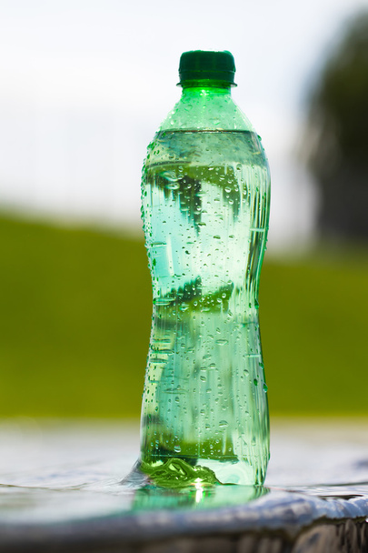 water in green bottle  - Photo, Image