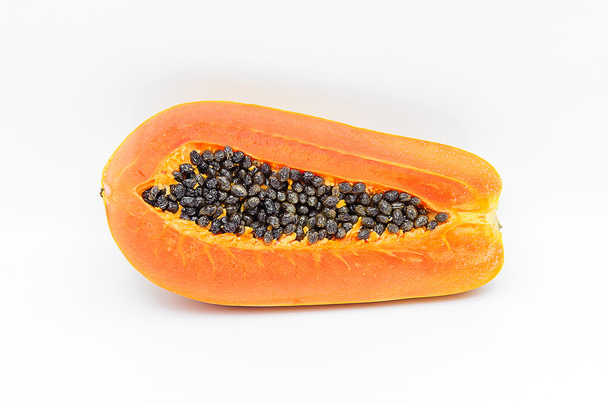 Rijpe papaya met schaduw. - Foto, afbeelding