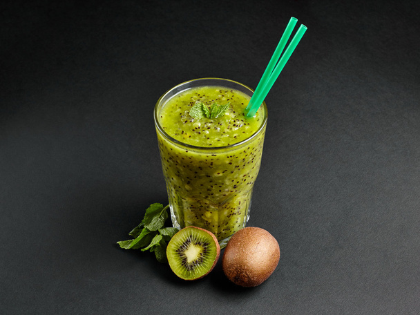 Fresh green smoothie with kiwi and mint . Love for a healthy raw food concept. Healthy eating. Fruit Smoothies. Kiwi. - Photo, Image