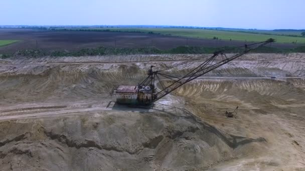 Flying in the career of an excavator - Footage, Video