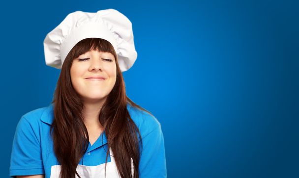 Retrato de una joven chef satisfecha
 - Foto, imagen