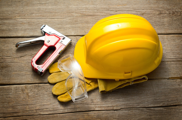 Yellow hard hat and working tools - Fotoğraf, Görsel