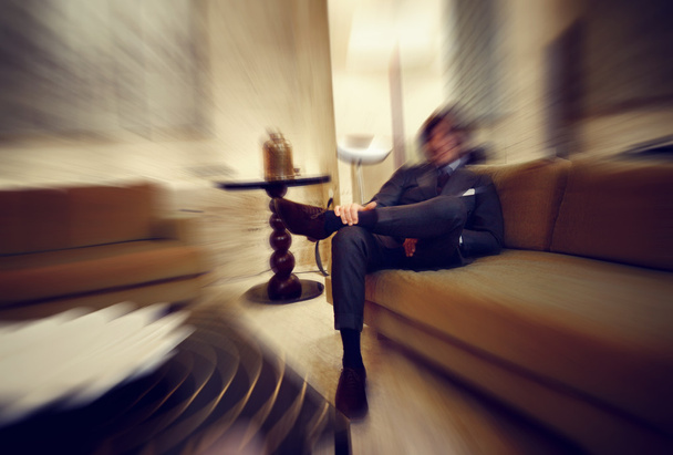 blurred colorful background of business man in luxury interior - Foto, afbeelding