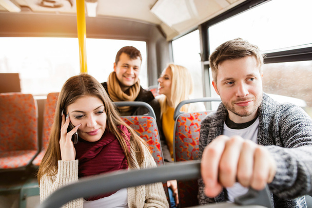 Group of young people traveling by bus, having fun - Foto, Bild