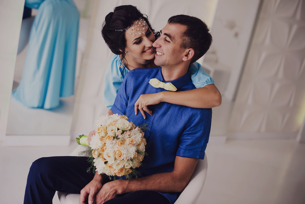 Beautiful, perfect couple posing on their wedding day. Close up shoot - Фото, изображение