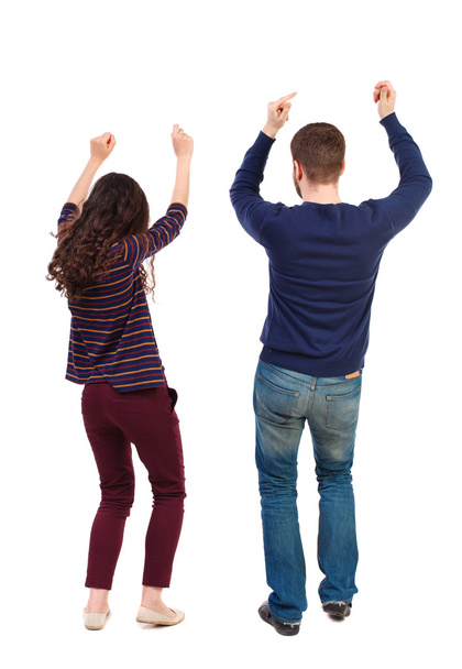 Back view of dancing young couple. Dance party. - Foto, imagen
