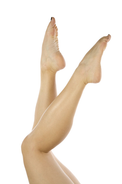 Womans legs toes up in the air - Fotoğraf, Görsel