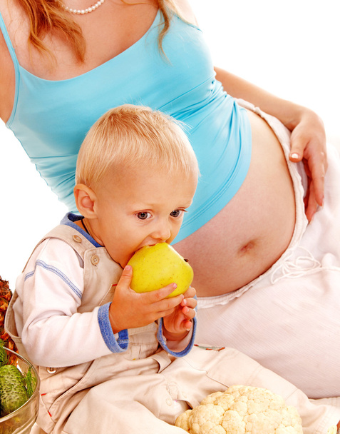 Mujer embarazada y niño
 . - Foto, Imagen