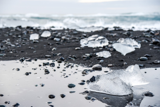 Icebergs on black volcanic beach, Iceland - Photo, Image