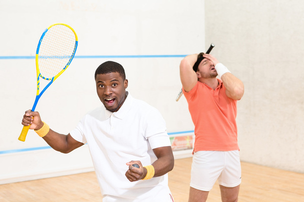 Men playing squash - Photo, image