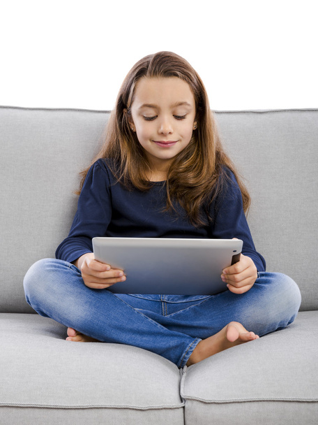 дівчина на дивані за допомогою планшета
 - Фото, зображення