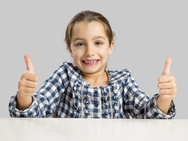 girl with thumbs up at school - Photo, image