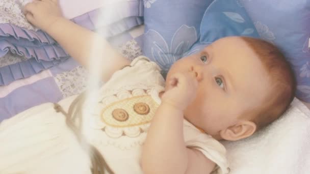 Little adorable baby lie in crib. Motherhood. Mothering. Cute. Love. Child - Materiaali, video