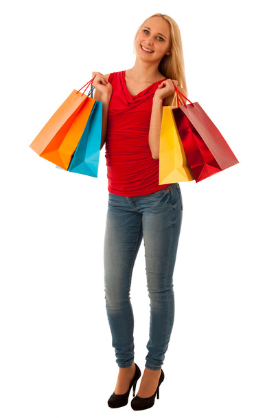 Beautiful young woman with shopping bags consumerism isolated ov - Fotografie, Obrázek