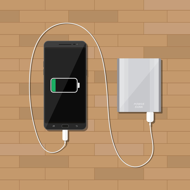 powerbank charging smartphone on wooden desk - Wektor, obraz