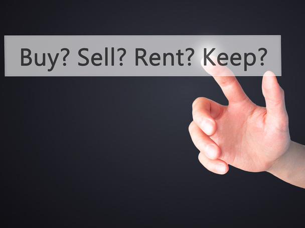 Buy? Sell? Rent? Keep? - Hand pressing a button on blurred backg - Fotoğraf, Görsel