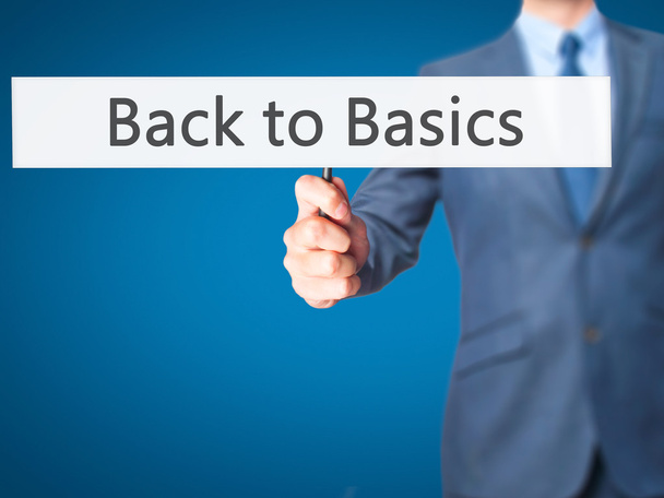 Back to Basics - Business man showing sign - Photo, Image